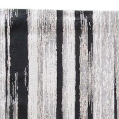 4' X 6' Black Silver and Gray Abstract Power Loom Area Rug
